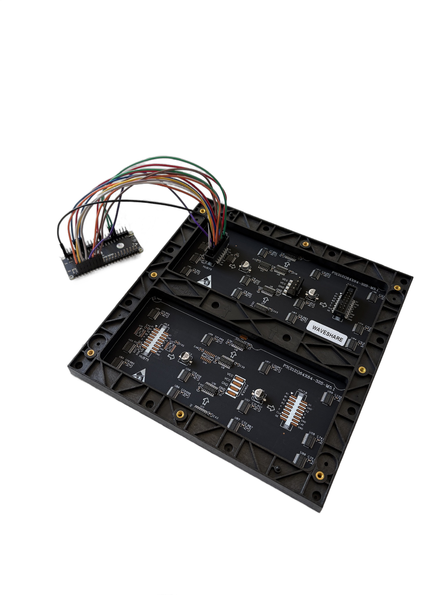 The back of the HUB75 LED panel with the ESP32-S3 microcontroller wired to it by a ribbon of jumper wires.